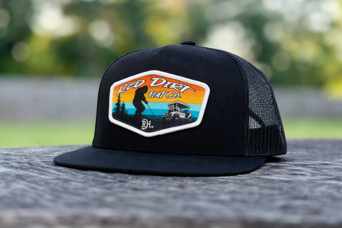 Red Dirt Hat Co Tee’d Off black flat brim cap with colourful golf patch